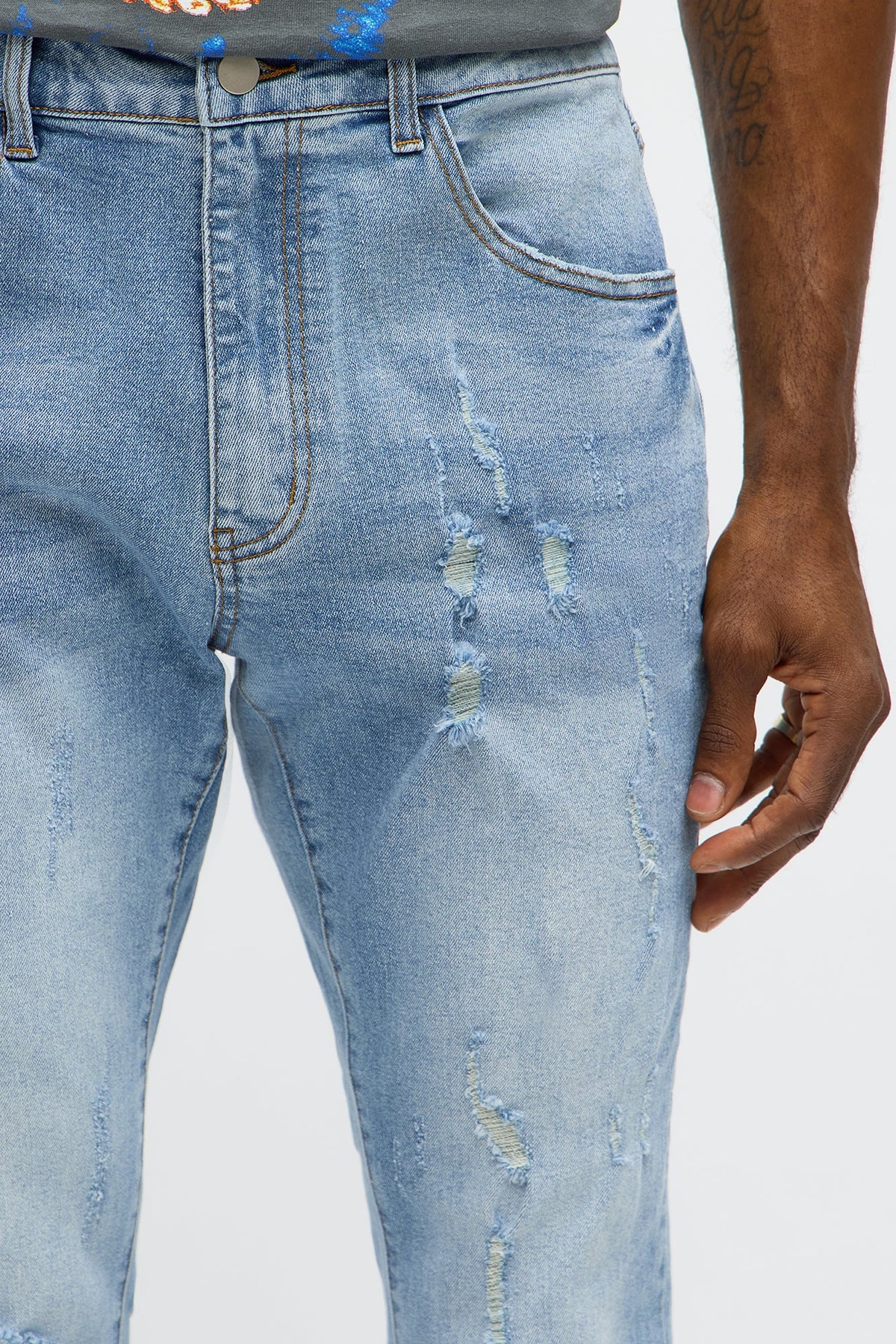 Stacked Skinny Flare Slit Rebel Against Distressed Jean - Light Wash